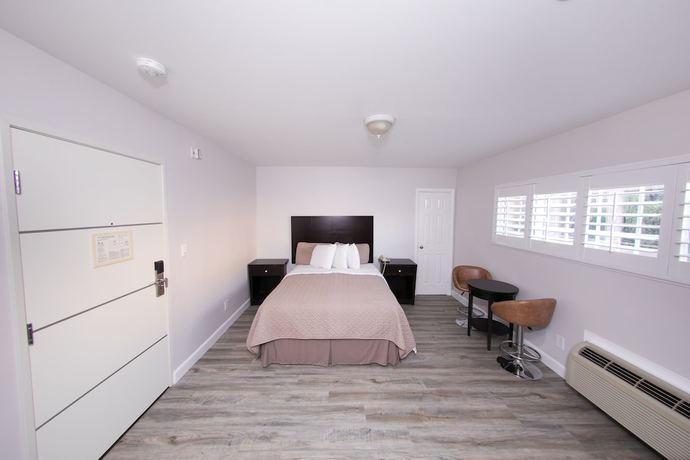 Imagen de la habitación del Hotel Metropolitan Inn and Suites. Foto 14