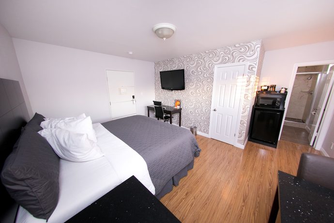 Imagen de la habitación del Hotel Metropolitan Inn and Suites. Foto 18