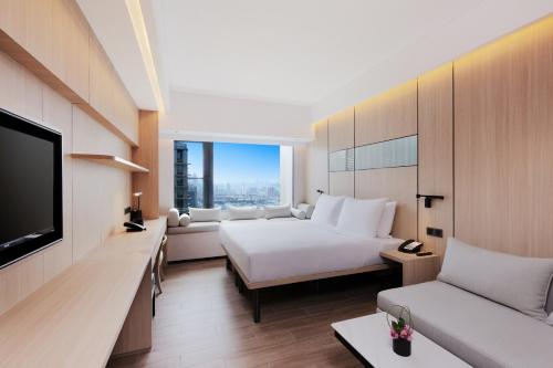 Imagen de la habitación del Hotel Metropolitan Residence. Foto 18