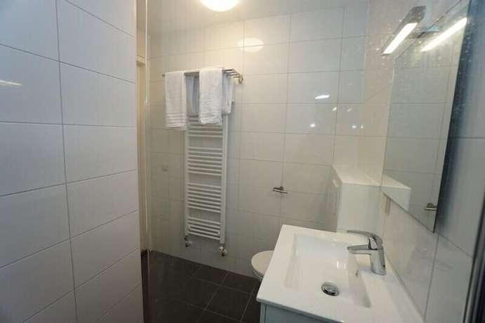 Imagen de la habitación del Hotel Metropolitan Rotterdam. Foto 5