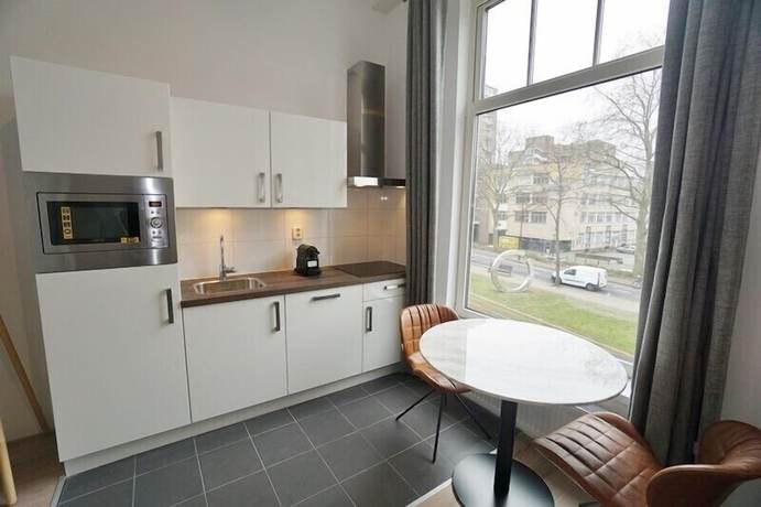 Imagen de la habitación del Hotel Metropolitan Rotterdam. Foto 6