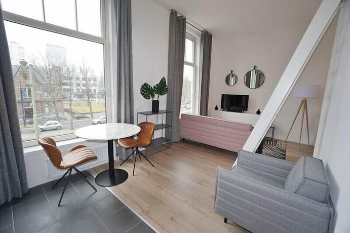 Imagen de la habitación del Hotel Metropolitan Rotterdam. Foto 8