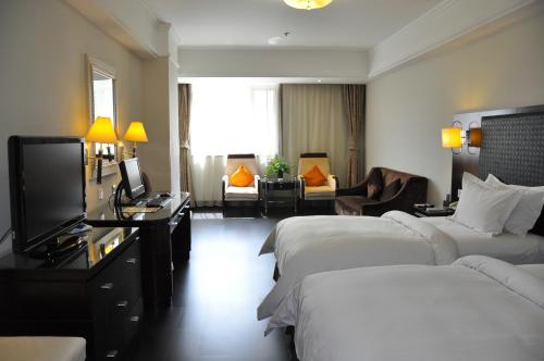 Imagen de la habitación del Hotel Metropolo Baoji, Baoji East Railway Station. Foto 5