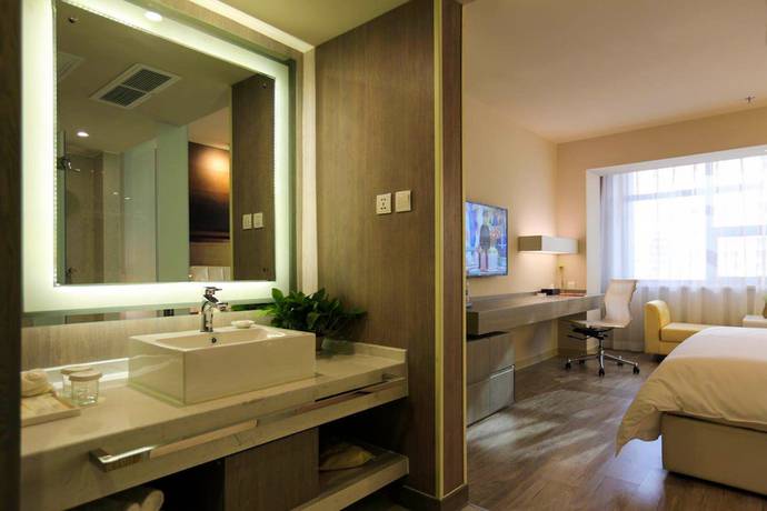 Imagen de la habitación del Hotel Metropolo Baotou Railway Station. Foto 12