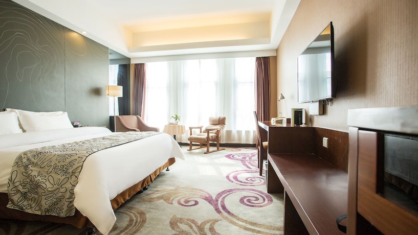 Imagen de la habitación del Hotel Metropolo Changzhou Dinosaur Park Xinbei Wanda Plaza. Foto 6