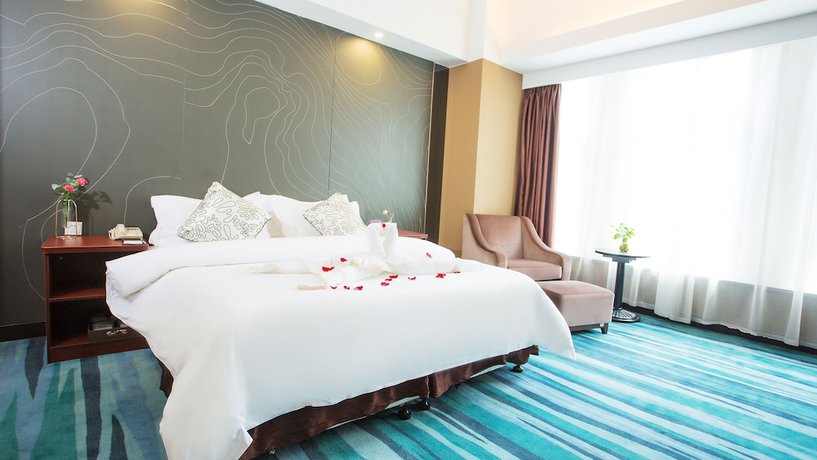 Imagen de la habitación del Hotel Metropolo Changzhou Dinosaur Park Xinbei Wanda Plaza. Foto 12
