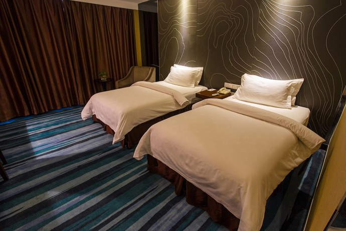 Imagen de la habitación del Hotel Metropolo Changzhou Dinosaur Park Xinbei Wanda Plaza. Foto 19