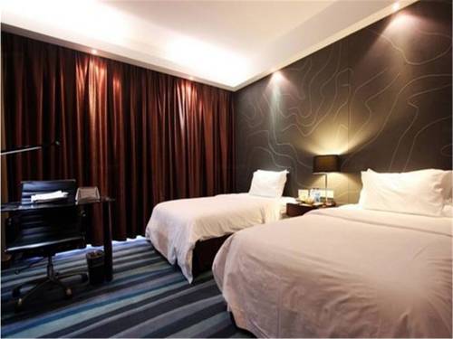 Imagen de la habitación del Hotel Metropolo Fuzhou Taijiang. Foto 4