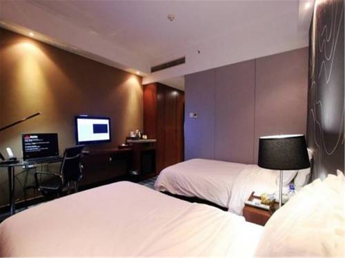 Imagen de la habitación del Hotel Metropolo Fuzhou Taijiang. Foto 6