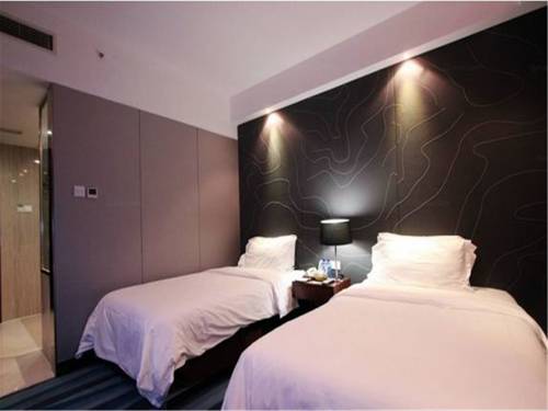 Imagen de la habitación del Hotel Metropolo Fuzhou Taijiang. Foto 7