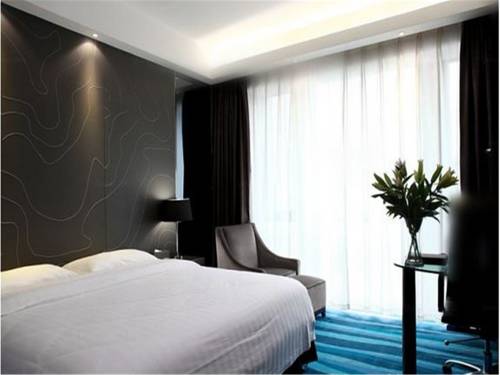 Imagen de la habitación del Hotel Metropolo Fuzhou Taijiang. Foto 10
