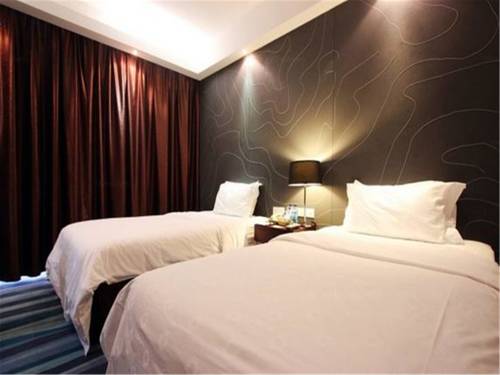 Imagen de la habitación del Hotel Metropolo Fuzhou Taijiang. Foto 12
