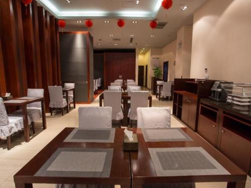 Imagen de la habitación del Hotel Metropolo, Fuzhou, Wanda Plaza-taijiang. Foto 9