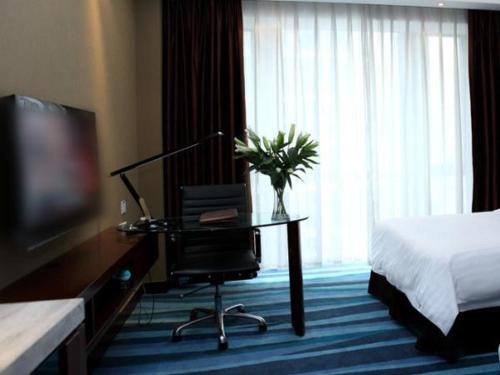 Imagen de la habitación del Hotel Metropolo, Fuzhou, Wanda Plaza-taijiang. Foto 10