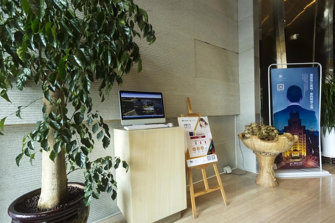 Imagen de los interiores del Hotel Metropolo Guangzhou Wanda Plaza. Foto 14