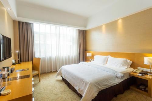 Imagen de la habitación del Hotel Metropolo, Guangzhou, Wanda Plaza-baiyun Mountain. Foto 3