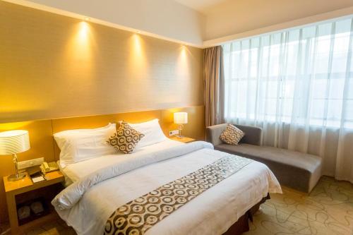Imagen de la habitación del Hotel Metropolo, Guangzhou, Wanda Plaza-baiyun Mountain. Foto 4