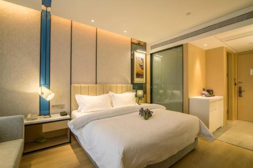 Imagen de la habitación del Hotel Metropolo Hangzhou Huanglong Sport Center Wensan R. Foto 5