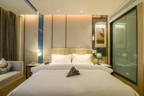 Imagen de la habitación del Hotel Metropolo Hangzhou Huanglong Sport Center Wensan R. Foto 7