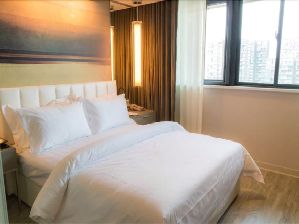 Imagen de la habitación del Hotel Metropolo Hangzhou Xiasha. Foto 3