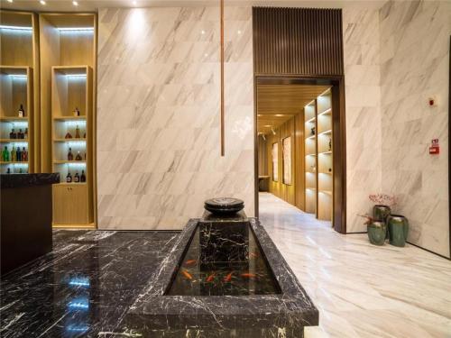 Imagen general del Hotel Metropolo Huazhong University Guanggu Avenue. Foto 10