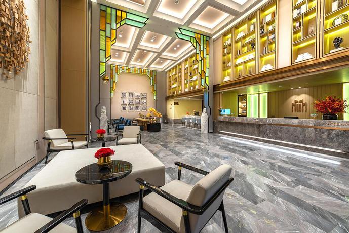 Imagen de los interiores del Hotel Metropolo Jingjiang - JiangNan market Shuang. Foto 9