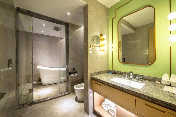 Imagen de la habitación del Hotel Metropolo Jingjiang - JiangNan market Shuang. Foto 2