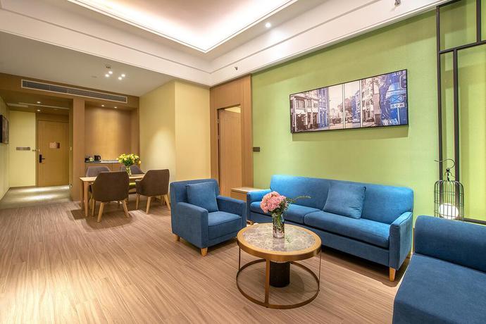 Imagen de la habitación del Hotel Metropolo Jingjiang - JiangNan market Shuang. Foto 3