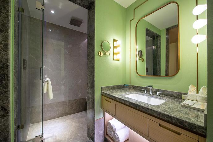 Imagen de la habitación del Hotel Metropolo Jingjiang - JiangNan market Shuang. Foto 5