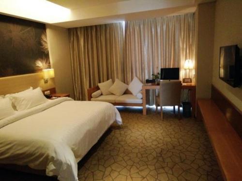 Imagen de la habitación del Hotel Metropolo Jinjiang Wanda Plaza. Foto 6