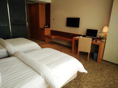 Imagen de la habitación del Hotel Metropolo Jinjiang Wanda Plaza. Foto 7
