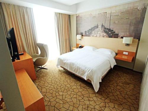 Imagen de la habitación del Hotel Metropolo Jinjiang Wanda Plaza. Foto 8