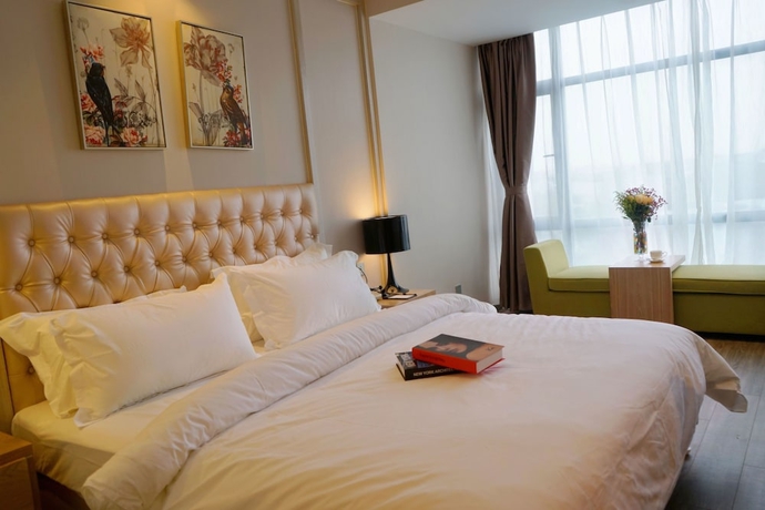 Imagen de la habitación del Hotel Metropolo Jinshanzui Village. Foto 9