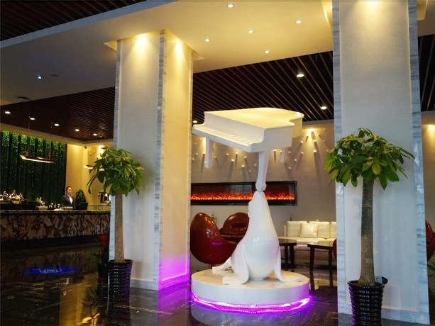 Imagen de los interiores del Hotel Metropolo Jinshanzui Village. Foto 19