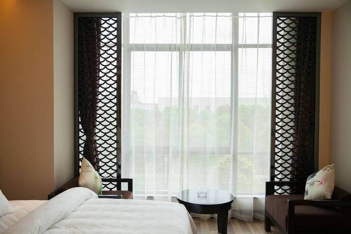 Imagen de la habitación del Hotel Metropolo Liyang Tianmy Lake. Foto 16