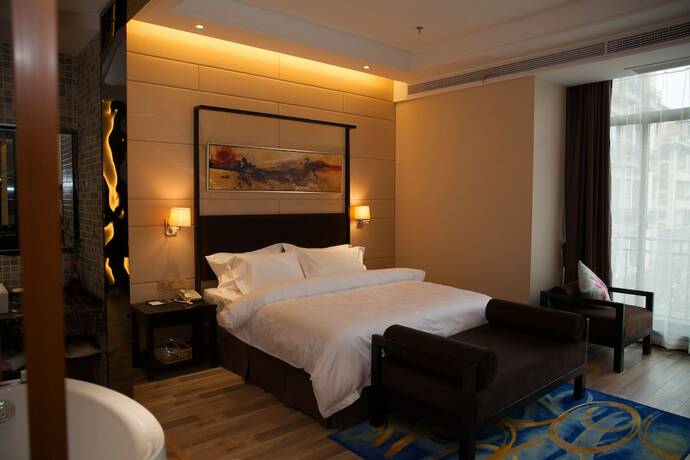 Imagen de la habitación del Hotel Metropolo Liyang Tianmy Lake. Foto 17