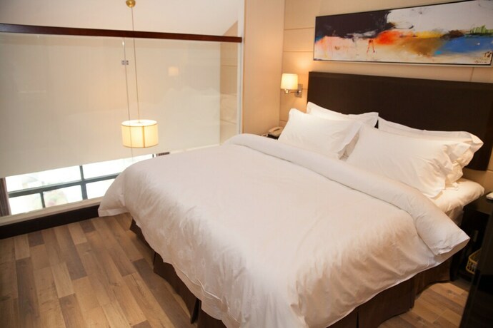 Imagen de la habitación del Hotel Metropolo Liyang Tianmy Lake. Foto 20