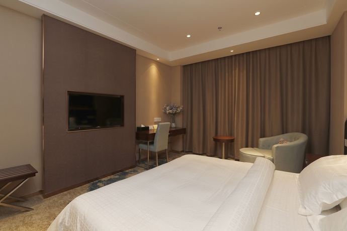 Imagen de la habitación del Hotel Metropolo Nanjiang Baijia Lake. Foto 10