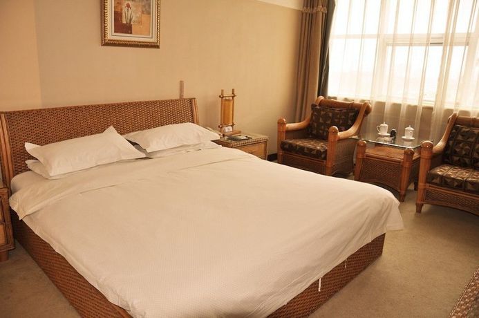Imagen de la habitación del Hotel Metropolo Qingdao Chengyang Municiple Government. Foto 4