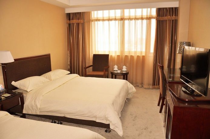 Imagen de la habitación del Hotel Metropolo Qingdao Chengyang Municiple Government. Foto 6
