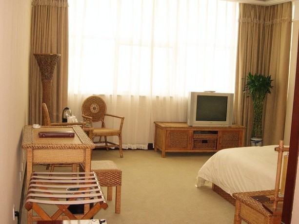 Imagen de la habitación del Hotel Metropolo Qingdao Chengyang Municiple Government. Foto 8