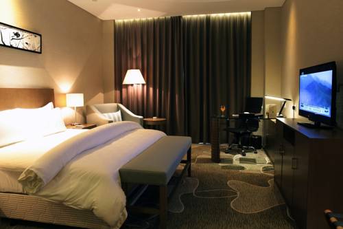 Imagen de la habitación del Hotel Metropolo Shanghai Changzhong Road. Foto 9