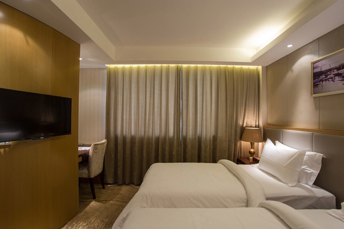 Imagen de la habitación del Hotel Metropolo Shanghai Minhang. Foto 12