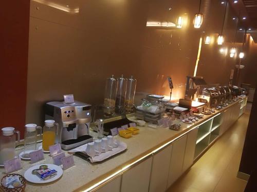 Imagen de la habitación del Hotel Metropolo Shijiazhuang Yuhua. Foto 7