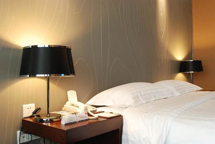 Imagen de la habitación del Hotel Metropolo Wuhan Economic Development Wanda. Foto 3