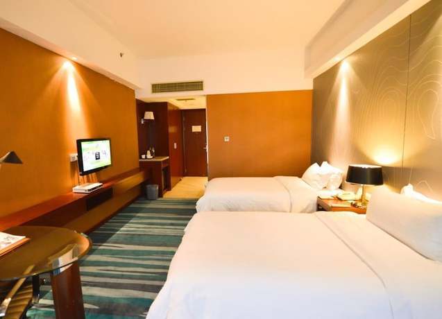 Imagen de la habitación del Hotel Metropolo Wuhan Economic Development Wanda. Foto 5