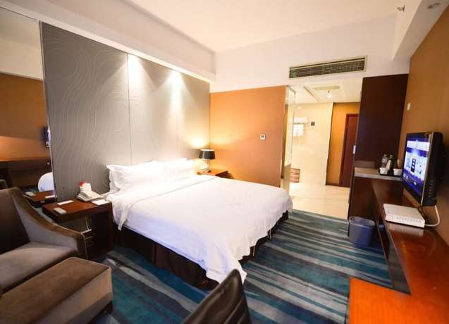 Imagen de la habitación del Hotel Metropolo Wuhan Economic Development Wanda. Foto 6