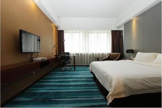 Imagen de la habitación del Hotel Metropolo Wuhan Economic Development Wanda. Foto 7