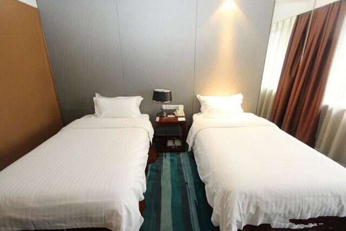 Imagen de la habitación del Hotel Metropolo Wuhan Economic Development Wanda. Foto 9