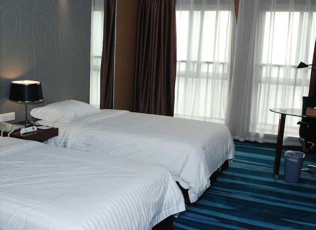 Imagen de la habitación del Hotel Metropolo Wuhan Economic Development Wanda. Foto 12
